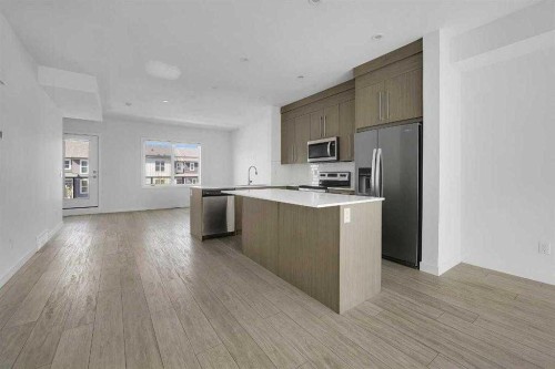693 Savanna Boulevard Ne, Calgary, AB - Indoor Photo Showing Kitchen With Stainless Steel Kitchen