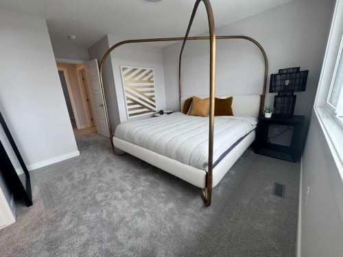 191 Lanark Gate Se, Airdrie, AB - Indoor Photo Showing Bedroom