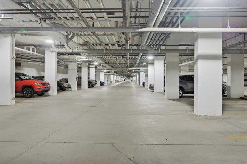 1301-8500 19 Avenue, Calgary, AB - Indoor Photo Showing Garage