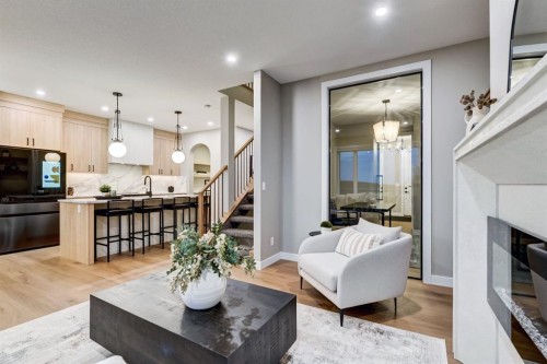540 Lawthorn Way, Airdrie, AB - Indoor Photo Showing Living Room With Fireplace