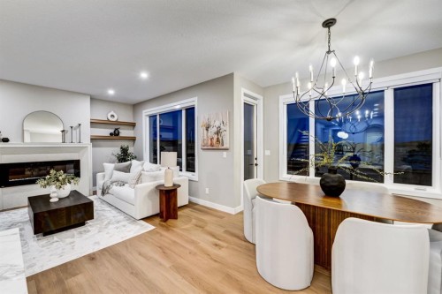 540 Lawthorn Way, Airdrie, AB - Indoor With Fireplace