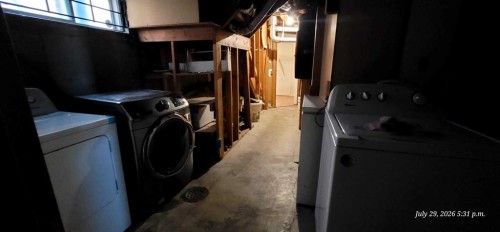 176 Penbrooke Close Se, Calgary, AB - Indoor Photo Showing Laundry Room