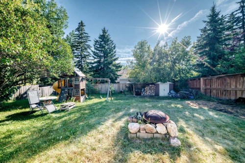 179 Deer Ridge Way Se, Calgary, AB - Outdoor With Backyard