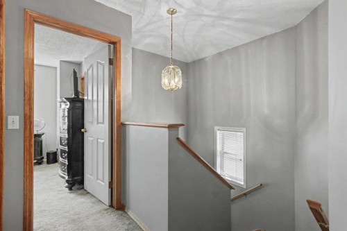 311 Erin Circle Se, Calgary, AB - Indoor Photo Showing Other Room