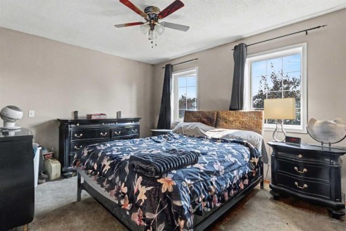 311 Erin Circle Se, Calgary, AB - Indoor Photo Showing Bedroom