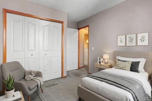 311 Erin Circle Se, Calgary, AB - Indoor Photo Showing Bedroom