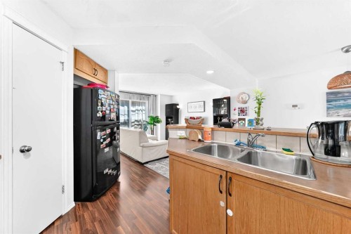 53 Tuscany Springs Heights Nw, Calgary, AB - Indoor Photo Showing Kitchen With Double Sink