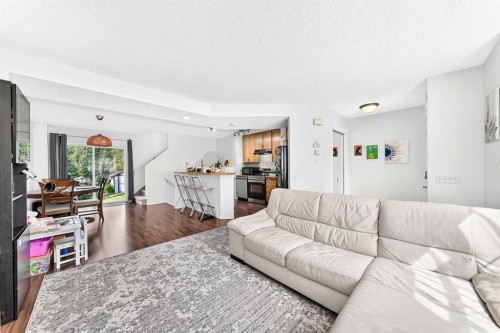 53 Tuscany Springs Heights Nw, Calgary, AB - Indoor Photo Showing Living Room