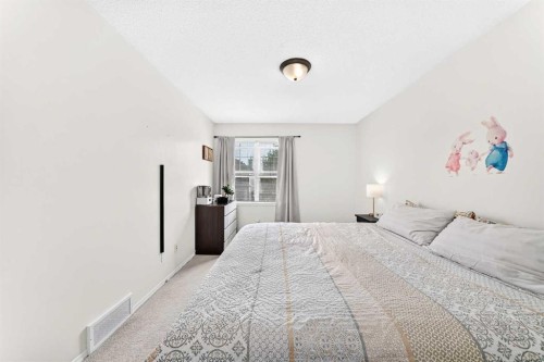 53 Tuscany Springs Heights Nw, Calgary, AB - Indoor Photo Showing Bedroom
