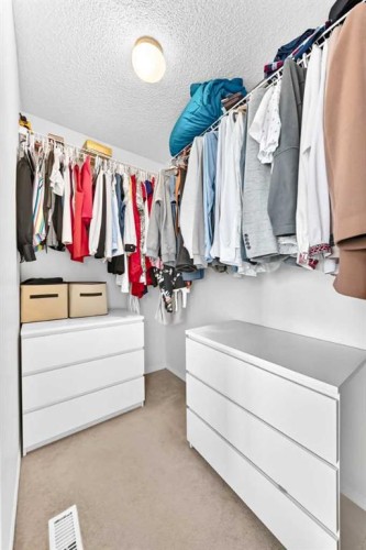 53 Tuscany Springs Heights Nw, Calgary, AB - Indoor With Storage