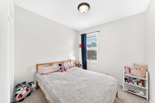 53 Tuscany Springs Heights Nw, Calgary, AB - Indoor Photo Showing Bedroom