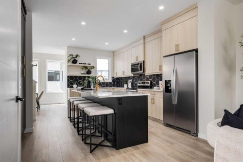 88 Bluerock Terrace Sw, Calgary, AB - Indoor Photo Showing Kitchen With Upgraded Kitchen