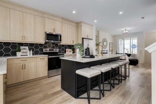 88 Bluerock Terrace Sw, Calgary, AB - Indoor Photo Showing Kitchen