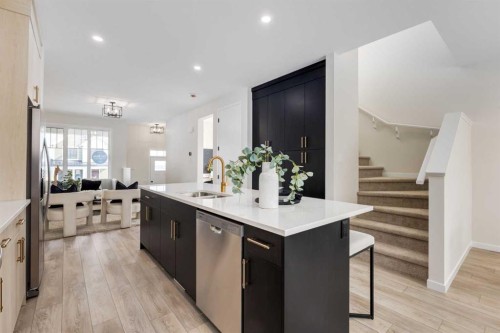 88 Bluerock Terrace Sw, Calgary, AB - Indoor Photo Showing Kitchen With Double Sink With Upgraded Kitchen