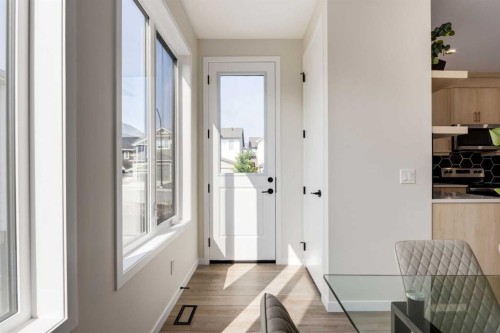 88 Bluerock Terrace Sw, Calgary, AB - Indoor Photo Showing Other Room