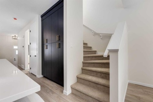 88 Bluerock Terrace Sw, Calgary, AB - Indoor Photo Showing Other Room