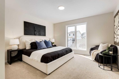 88 Bluerock Terrace Sw, Calgary, AB - Indoor Photo Showing Bedroom