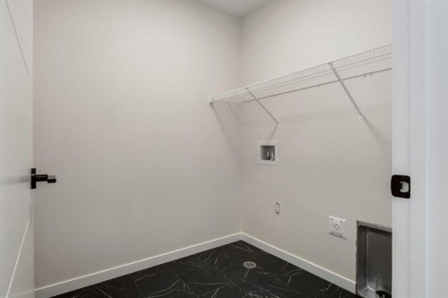 88 Bluerock Terrace Sw, Calgary, AB - Indoor With Storage
