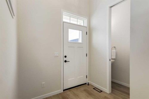88 Bluerock Terrace Sw, Calgary, AB - Indoor Photo Showing Other Room
