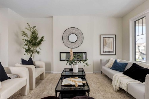 88 Bluerock Terrace Sw, Calgary, AB - Indoor Photo Showing Living Room