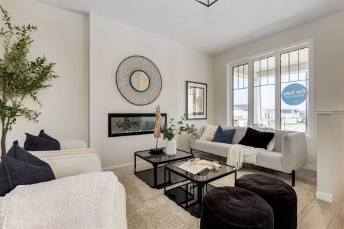 88 Bluerock Terrace Sw, Calgary, AB - Indoor Photo Showing Living Room With Fireplace