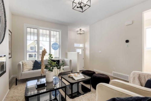 88 Bluerock Terrace Sw, Calgary, AB - Indoor Photo Showing Living Room