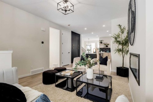 88 Bluerock Terrace Sw, Calgary, AB - Indoor Photo Showing Living Room