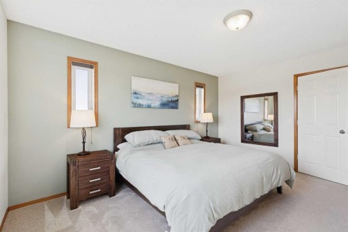 16 Henderson Bay Ne, Langdon, AB - Indoor Photo Showing Bedroom
