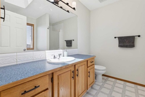 16 Henderson Bay Ne, Langdon, AB - Indoor Photo Showing Bathroom