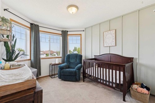 16 Henderson Bay Ne, Langdon, AB - Indoor Photo Showing Bedroom