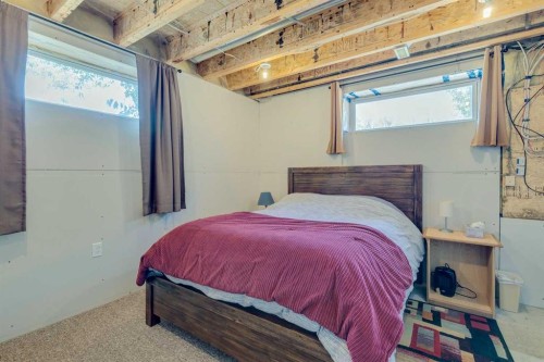16 Henderson Bay Ne, Langdon, AB - Indoor Photo Showing Bedroom