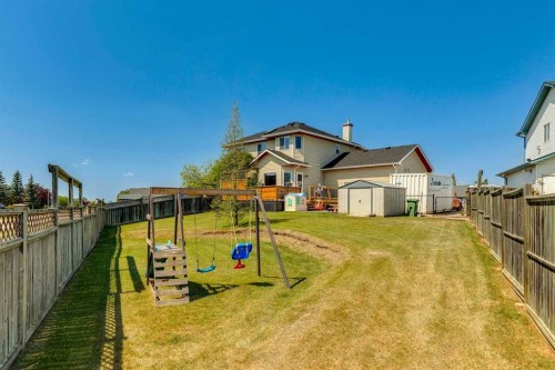 16 Henderson Bay Ne, Langdon, AB - Outdoor With Backyard