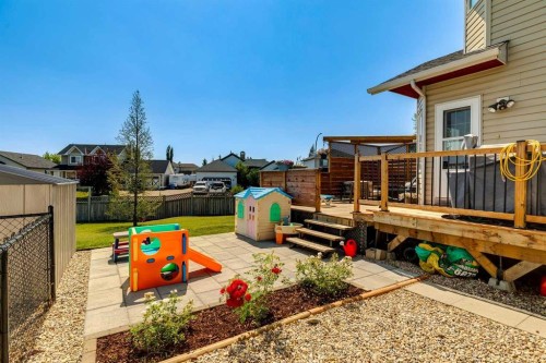 16 Henderson Bay Ne, Langdon, AB - Outdoor With Deck Patio Veranda