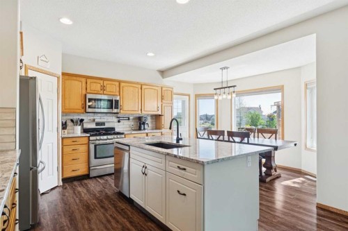 16 Henderson Bay Ne, Langdon, AB - Indoor Photo Showing Kitchen With Stainless Steel Kitchen With Upgraded Kitchen