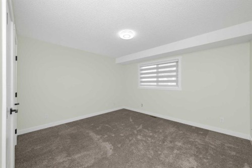 98 Del Ray Road Ne, Calgary, AB - Indoor Photo Showing Other Room