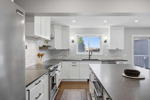 87 Couture Crescent Sw, Calgary, AB - Indoor Photo Showing Kitchen With Upgraded Kitchen