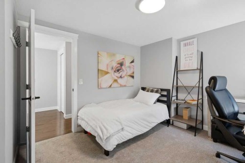 87 Couture Crescent Sw, Calgary, AB - Indoor Photo Showing Bedroom