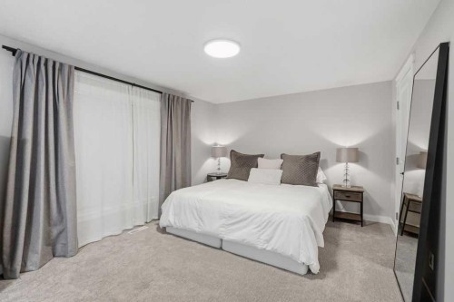 87 Couture Crescent Sw, Calgary, AB - Indoor Photo Showing Bedroom