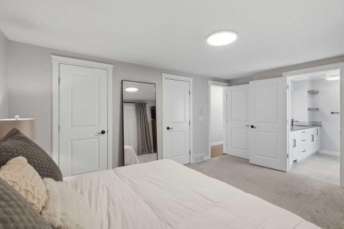 87 Couture Crescent Sw, Calgary, AB - Indoor Photo Showing Bedroom