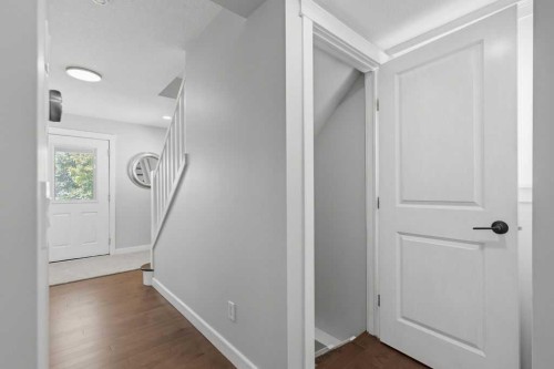 87 Couture Crescent Sw, Calgary, AB - Indoor Photo Showing Other Room