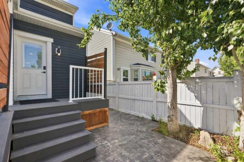87 Couture Crescent Sw, Calgary, AB - Outdoor With Deck Patio Veranda