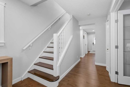 87 Couture Crescent Sw, Calgary, AB - Indoor Photo Showing Other Room