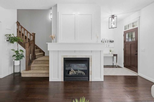 2630 Mclean Avenue Sw, Calgary, AB - Indoor Photo Showing Living Room With Fireplace