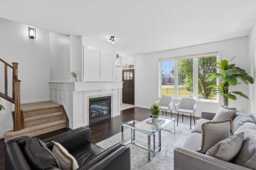 2630 Mclean Avenue Sw, Calgary, AB - Indoor Photo Showing Living Room With Fireplace
