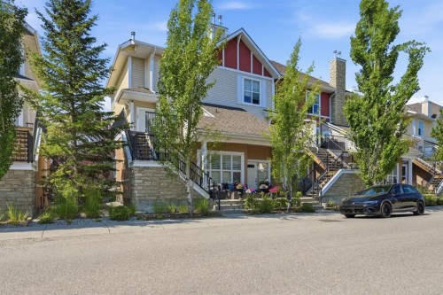 128 West Springs Road Sw, Calgary, AB - Outdoor With Facade