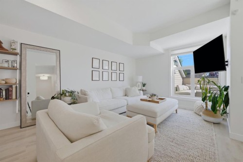 128 West Springs Road Sw, Calgary, AB - Indoor Photo Showing Living Room