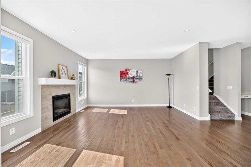 82 Nolanhurst Rise Nw, Calgary, AB - Indoor Photo Showing Living Room With Fireplace