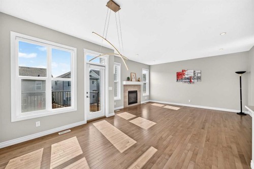 82 Nolanhurst Rise Nw, Calgary, AB - Indoor Photo Showing Other Room With Fireplace