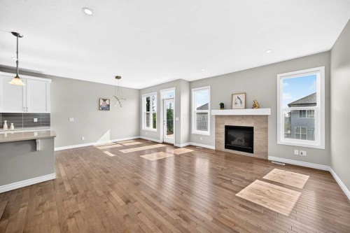 82 Nolanhurst Rise Nw, Calgary, AB - Indoor Photo Showing Living Room With Fireplace
