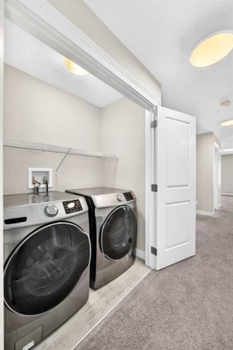 82 Nolanhurst Rise Nw, Calgary, AB - Indoor Photo Showing Laundry Room